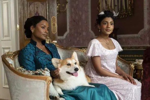 Die Sharma-Schwestern mit Corgi Newton