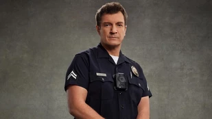 Nathan Fillion als John Nolan